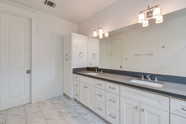 2718 Oakwood Crest Ln, Houston, TX 77018 - bathroom with visible vents, a sink, double vanity, and marble finish floor