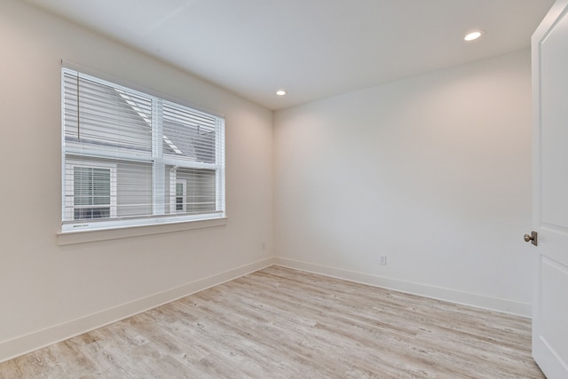 2718 Oakwood Crest Ln, Houston, TX 77018 - empty room with recessed lighting, light wood-style flooring, and baseboards