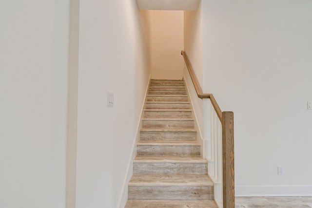 2718 Oakwood Crest Ln, Houston, TX 77018 - stairway with baseboards and wood finished floors