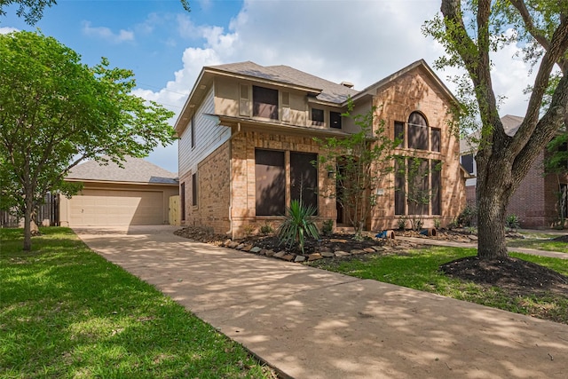 4530 Lakeside Meadow Dr, Missouri City, TX 77459 - view of front of home featuring brick siding, concrete driveway, and a front lawn