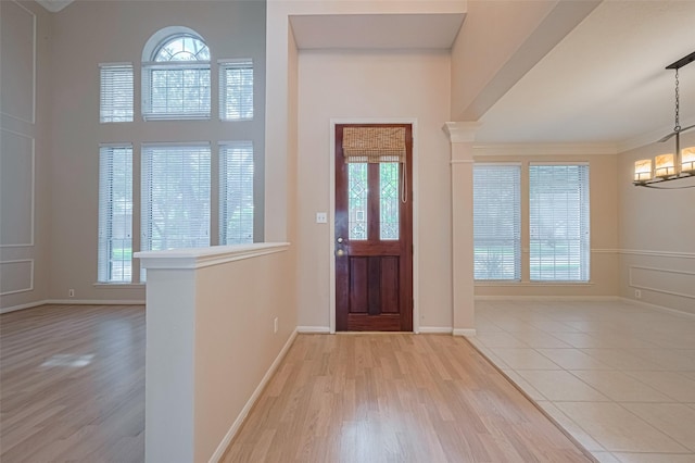 4530 Lakeside Meadow Dr, Missouri City, TX 77459 - foyer with wood finished floors, baseboards, and a towering ceiling