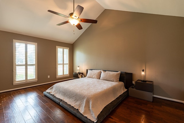 bedroom with baseboards, high vaulted ceiling, and wood finished floors