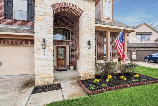 2807 Merlin Ln, Pearland, TX 77581 - entrance to property with stone siding, brick siding, and concrete driveway
