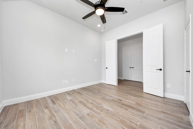 unfurnished bedroom featuring baseboards, recessed lighting, light wood finished floors, and visible vents