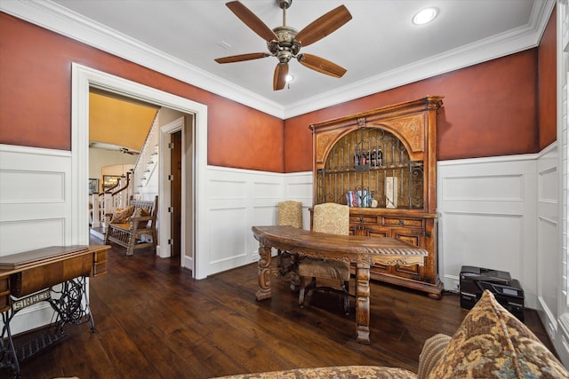 dining room with stairs, ceiling fan, a decorative wall, and a wainscoted wall