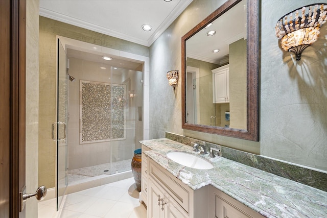 bathroom with tile patterned flooring, a shower stall, vanity, ornamental molding, and recessed lighting