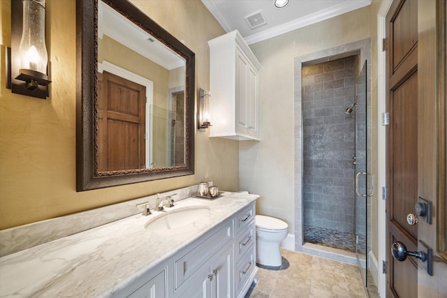 bathroom featuring visible vents, crown molding, vanity, toilet, and a stall shower