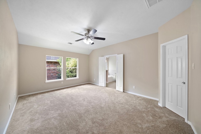 unfurnished bedroom with visible vents, carpet, and baseboards