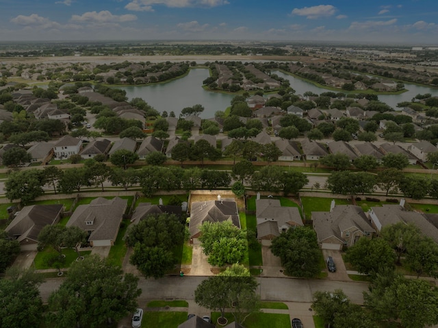 aerial view with a residential view and a water view