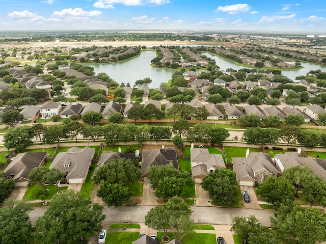 aerial view featuring a water view and a residential view