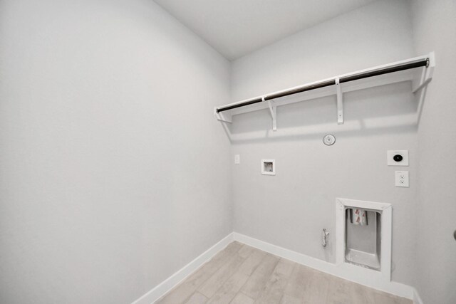 clothes washing area featuring washer hookup, gas dryer hookup, laundry area, and hookup for an electric dryer