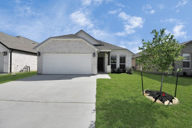 ranch-style home featuring an attached garage, stone siding, a front yard, and concrete driveway