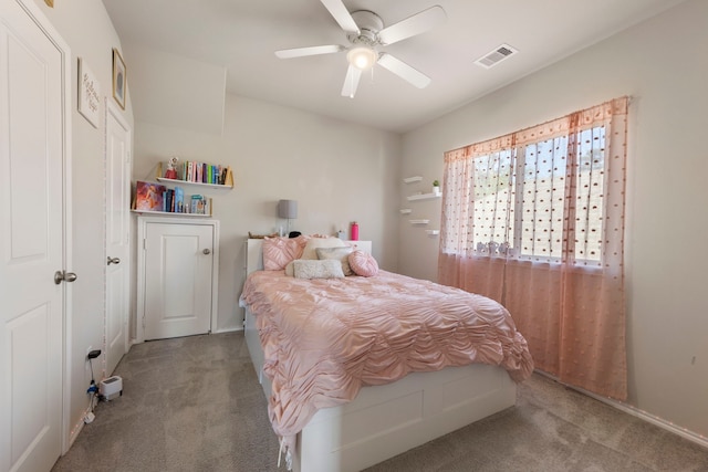 32055 August Woods Way, Conroe, TX 77385 - carpeted bedroom featuring a ceiling fan and visible vents