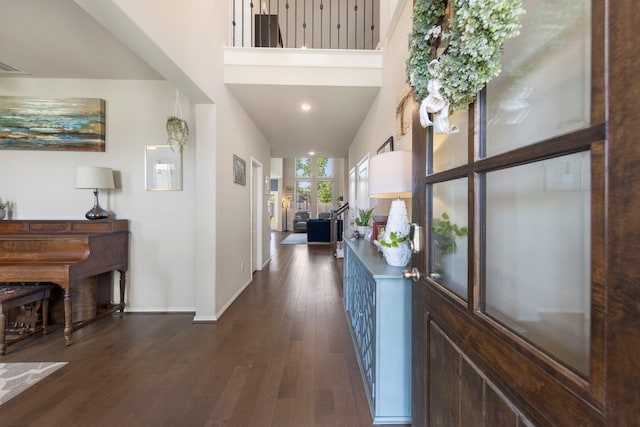 32055 August Woods Way, Conroe, TX 77385 - foyer featuring a high ceiling, baseboards, visible vents, and dark wood-style floors