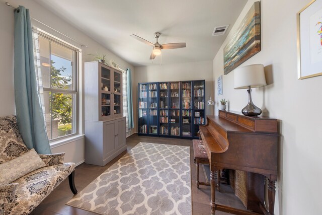 32055 August Woods Way, Conroe, TX 77385 - sitting room featuring wood finished floors, baseboards, a ceiling fan, and visible vents