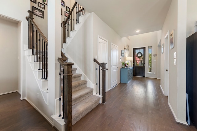 32055 August Woods Way, Conroe, TX 77385 - foyer with stairway, baseboards, and dark wood-style floors