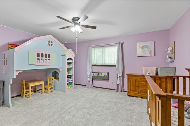 bedroom with baseboards and carpet