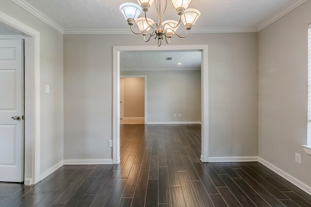 5950 Beaudry Dr, Houston, TX 77035 - unfurnished room with a chandelier, baseboards, and dark wood finished floors