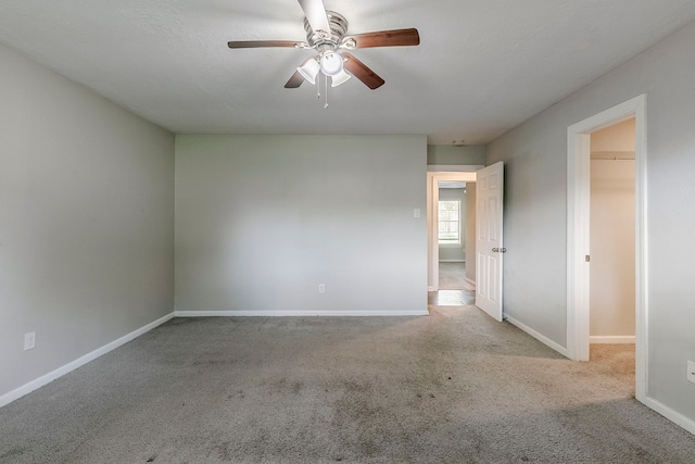5950 Beaudry Dr, Houston, TX 77035 - empty room featuring baseboards, carpet, and a ceiling fan