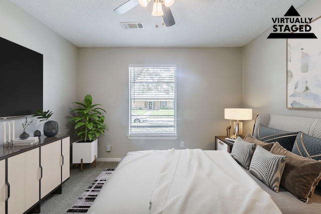 5950 Beaudry Dr, Houston, TX 77035 - carpeted bedroom with ceiling fan, visible vents, and baseboards