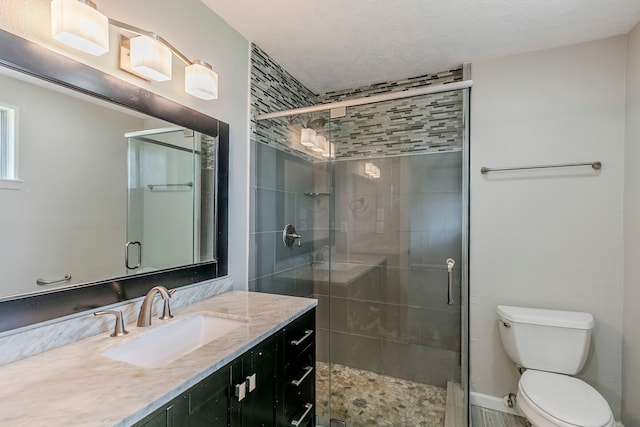5950 Beaudry Dr, Houston, TX 77035 - full bathroom featuring toilet, a shower stall, and vanity
