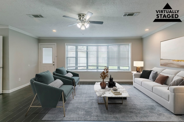 living area with baseboards, plenty of natural light, and wood finished floors