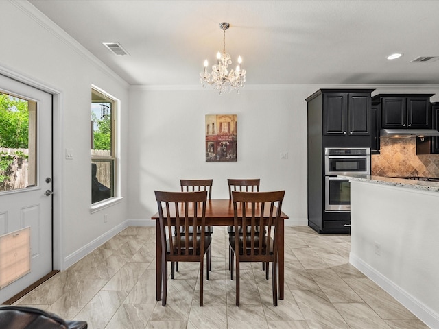 651 Tenuta Ln, League City, TX 77573 - dining space featuring visible vents, crown molding, a chandelier, and baseboards