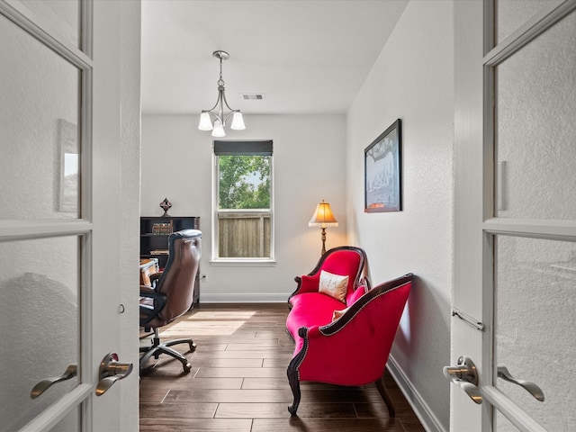 651 Tenuta Ln, League City, TX 77573 - office space featuring wood finished floors, visible vents, and baseboards