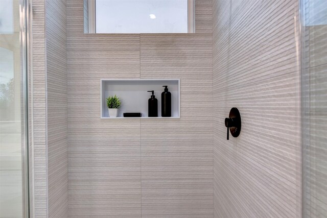 room details with a tile shower