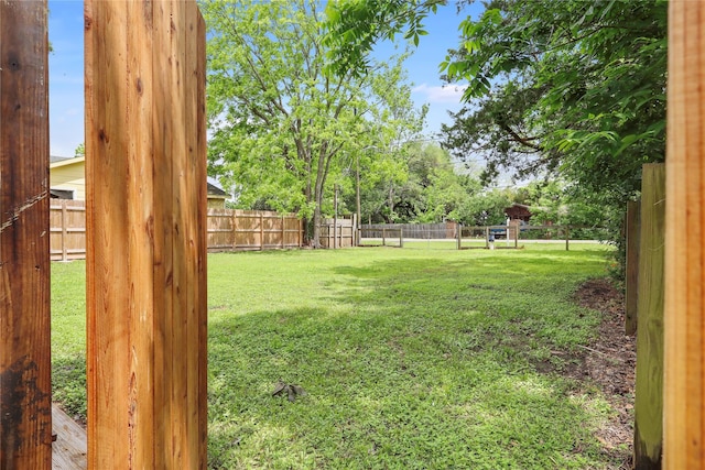 4622 4th St, Bacliff, TX 77518 - view of yard featuring a fenced backyard