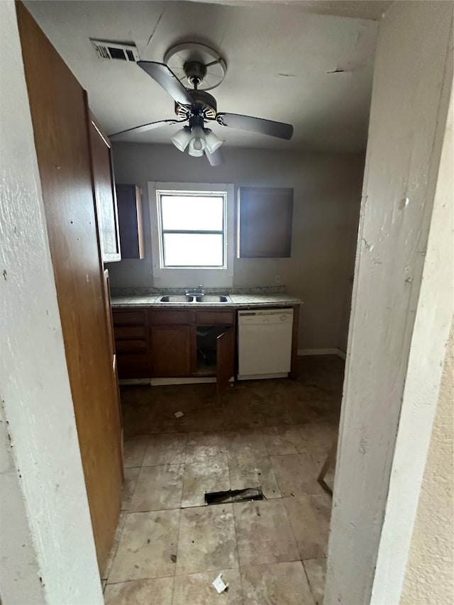 2038 Norfolk St Unit A, Houston, TX 77098 - kitchen with ceiling fan, visible vents, white dishwasher, built in study area, and a sink