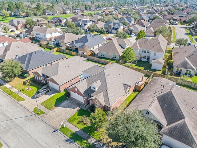 birds eye view of property with a residential view