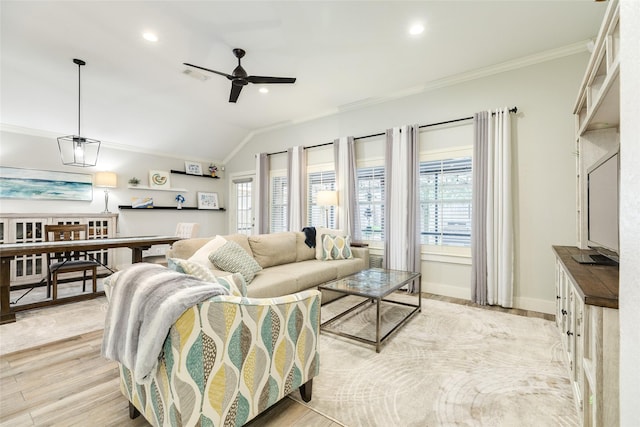 29 Clara Barton Ln, Galveston, TX 77551 - living room with visible vents, ornamental molding, a ceiling fan, and vaulted ceiling