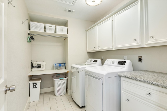 29 Clara Barton Ln, Galveston, TX 77551 - washroom featuring visible vents, cabinet space, baseboards, and separate washer and dryer