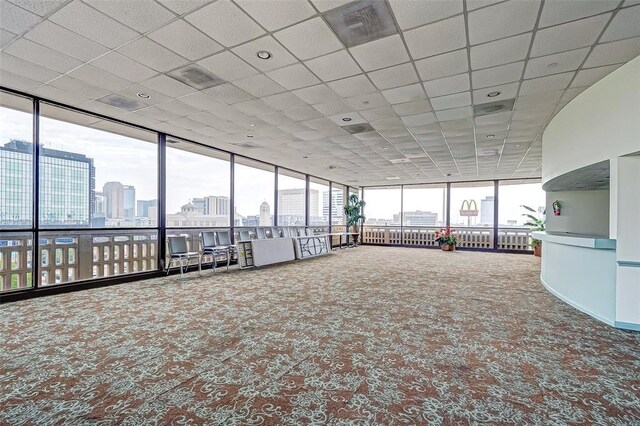 building lobby with visible vents and a view of city
