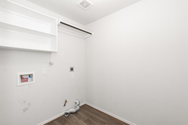laundry room with laundry area, hookup for an electric dryer, dark wood-type flooring, gas dryer hookup, and washer hookup