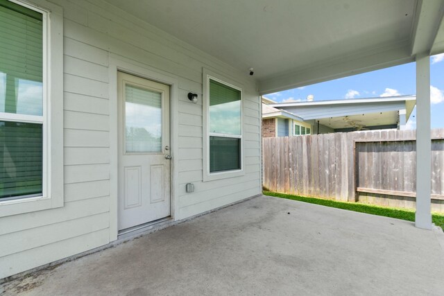 view of patio with fence