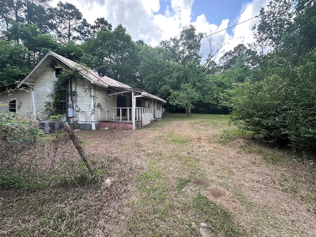 217 Box Factory Rd, Diboll, TX 75941 - view of yard with covered porch