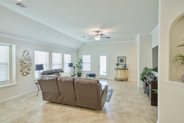 living area featuring ornamental molding, a ceiling fan, vaulted ceiling, baseboards, and light tile patterned flooring