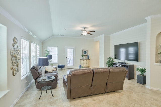 living area with baseboards, ornamental molding, ceiling fan, lofted ceiling, and light tile patterned floors