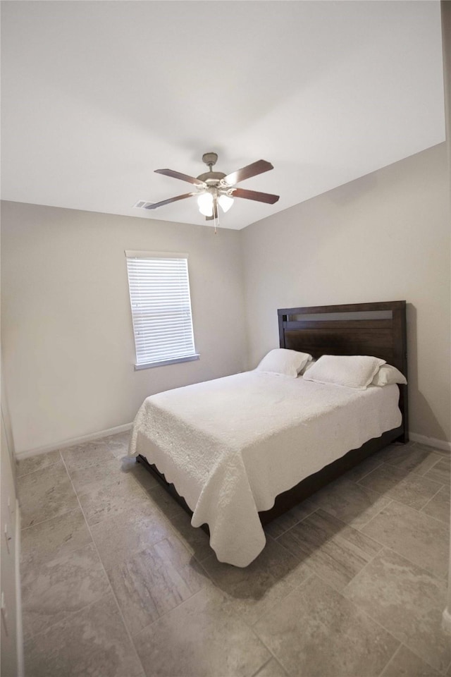 2757 Maxway Ct, League City, TX 77573 - bedroom featuring baseboards and a ceiling fan