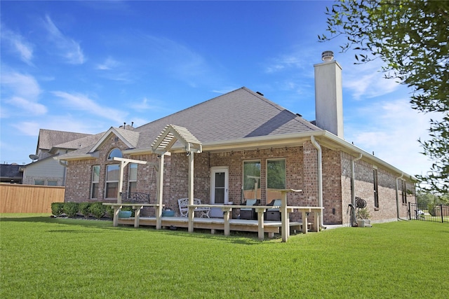 2757 Maxway Ct, League City, TX 77573 - rear view of house featuring fence, a chimney, a yard, and brick siding