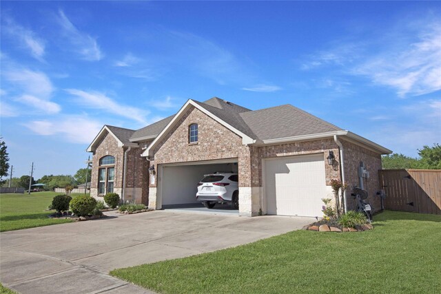 2757 Maxway Ct, League City, TX 77573 - view of front of house with concrete driveway, roof with shingles, brick siding, a front lawn, and a garage