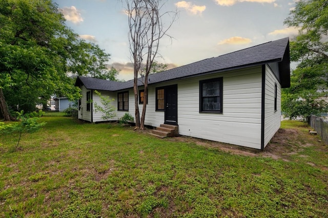 208 W Jefferson St, Trinity, TX 75862 - view of front of home featuring entry steps and roof with shingles