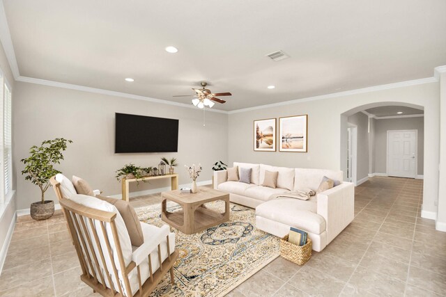 3250 Persimmon Grv, Richmond, TX 77469 - living area featuring light tile patterned floors, arched walkways, baseboards, visible vents, and recessed lighting
