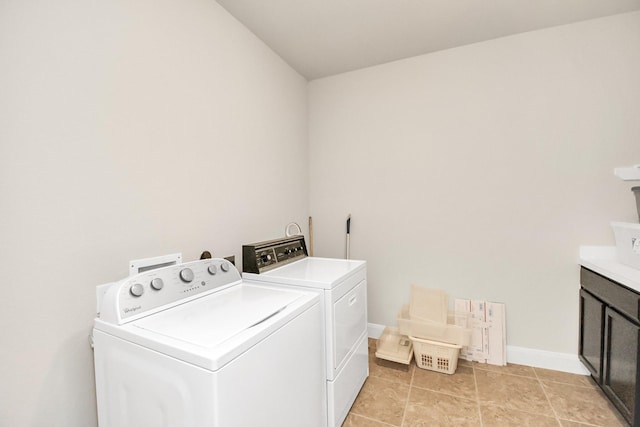 3250 Persimmon Grv, Richmond, TX 77469 - laundry room featuring washer and dryer, baseboards, and cabinet space
