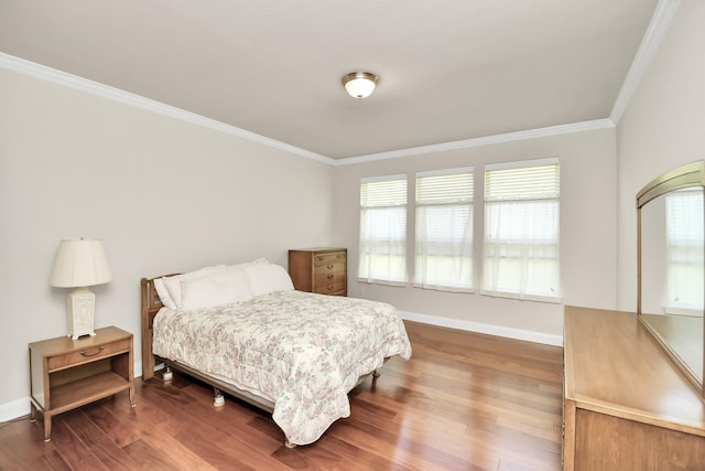 3250 Persimmon Grv, Richmond, TX 77469 - bedroom featuring dark wood-style flooring, ornamental molding, multiple windows, and baseboards