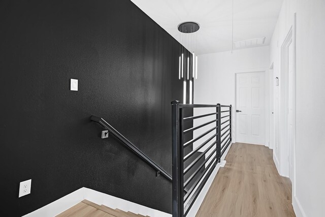 6726 Dumble St, Houston, TX 77021 - staircase featuring wood finished floors and baseboards
