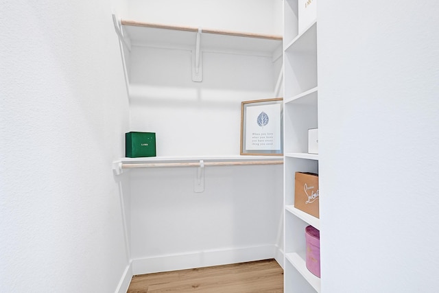 6726 Dumble St, Houston, TX 77021 - spacious closet featuring wood finished floors