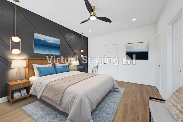 6726 Dumble St, Houston, TX 77021 - bedroom with wood finished floors, baseboards, a ceiling fan, and recessed lighting